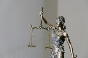 A figurine representing justice and the legal system.